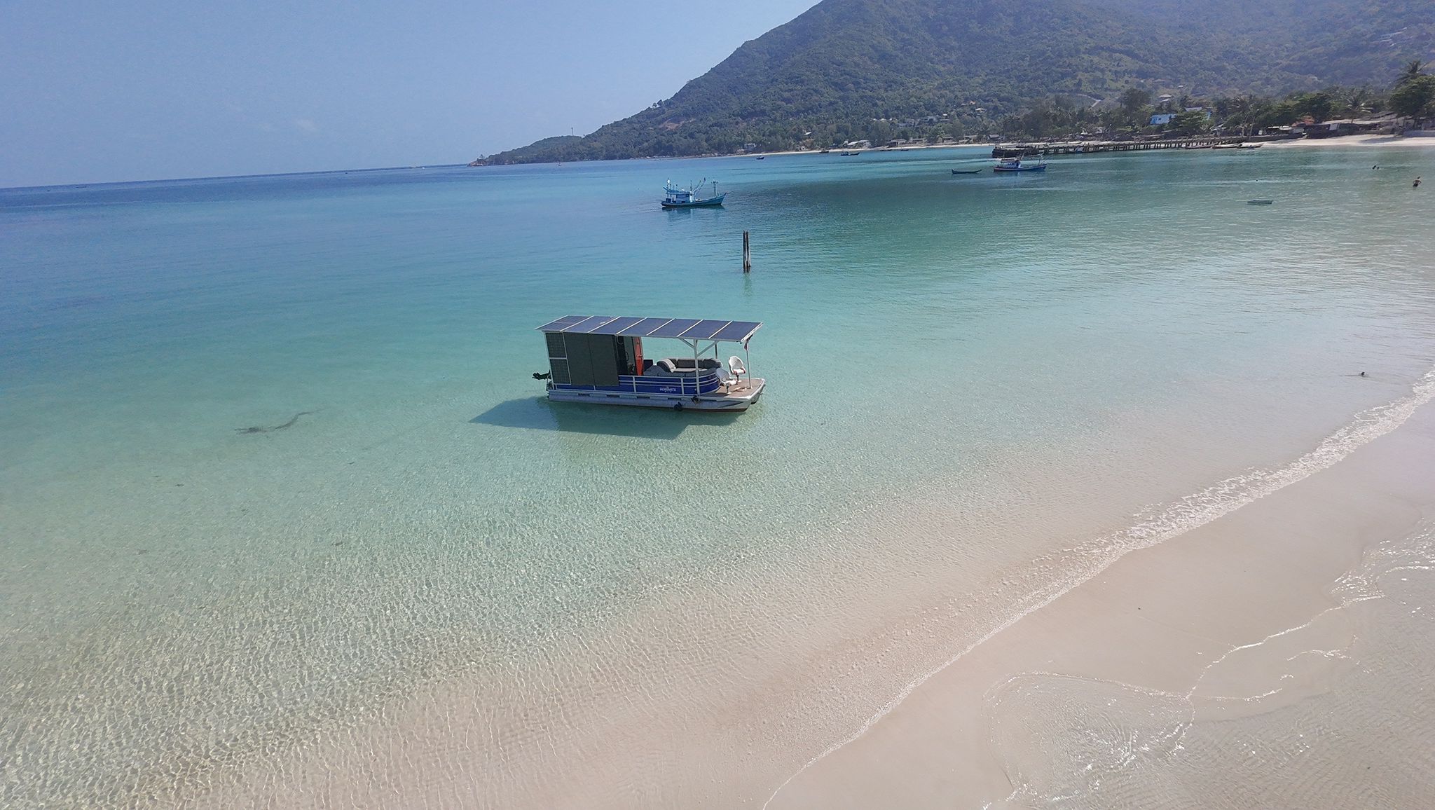 SolarStorm boat in stunning bay